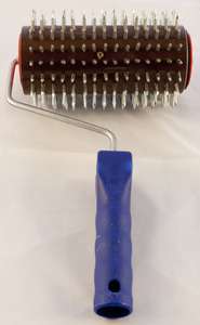 Rozluźniacz do miodu wrzosowego wałkowy duży. Rozluźniacz do miodu wrzosowego wałkowy duży.