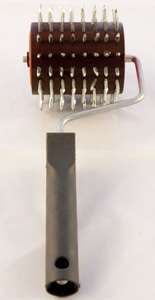 Rozluźniacz do miodu wrzosowego wałkowy mały. Rozluźniacz do miodu wrzosowego wałkowy mały.