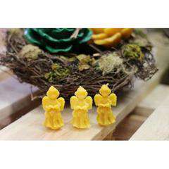 Świeca z wosku - ANIOŁEK Z KSIĄŻKĄ Świeca z wosku - ANIOŁEK Z KSIĄŻKĄ