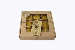 Zestaw tealightów 9 sztuk ze śnieżynką w opakowaniu Zestaw tealightów 9 sztuk ze śnieżynką w opakowaniu