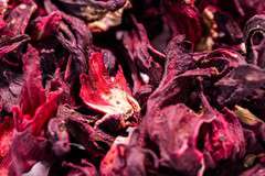 Hibiskus Kwiat 50g – Malwa Sudańska | Rubinowe Orzeźwienie Hibiskus Kwiat 50g – Malwa Sudańska | Rubinowe Orzeźwienie